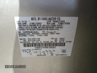 2011 Ford Taurus Limited z VIN 1FAHP2FW4BG100365, wystawiony jako Copart lot #53994645 z przebiegiem 93 803 mil mil oraz Szkoda całkowita • Salvage title. Historia ofert i sprzedaży dostępna na DreamBid. Obrazek 13.