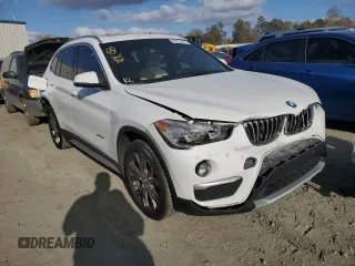 2017 BMW X1 sDrive28i with VIN WBXHU7C38H5H36694, listed as a Copart auction lot 65935442 with 96,213 mi miles. Bid and sale history available at carsss.com. Image 1.