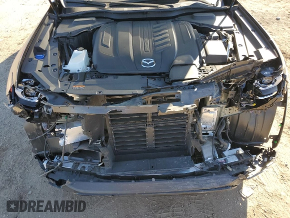 2025 Mazda CX-70 S Premium with VIN JM3KJDHC1S1103394, listed as a Copart auction lot 75949104 with 7,579 mi miles and Salvage title. Bid and sale history available at DreamBid. Image 12.