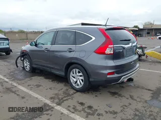 2015 Honda CR-V EX-L with VIN 2HKRM3H71FH540967, listed as a IAAI auction lot 41934678 with 74,206 mi miles. Bid and sale history available at carsss.com. Image 3.