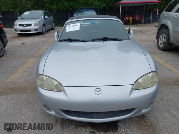 2002 Mazda MX-5 Miata Cloth with VIN JM1NB353820229890, listed as a IAAI auction lot 42750045 with 116,227 mi miles and . Bid and sale history available at DreamBid. Image 6.