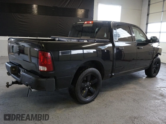 2018 Ram 1500 Big Horn with VIN 1C6RR6LM8JS354103, listed as a Copart auction lot 70140234 with 100,765 mi miles and Salvage Title. Bid and sale history available at carsss.com. Image 3.