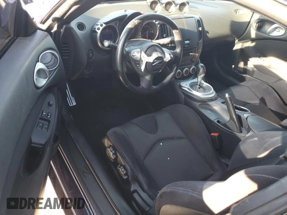 2017 Nissan 370Z z VIN JN1AZ4EH6HM952086, wystawiony jako Copart lot #88158105 z przebiegiem Nie podano mil oraz Szkoda całkowita • Salvage title. Historia ofert i sprzedaży dostępna na DreamBid. Obrazek 8.