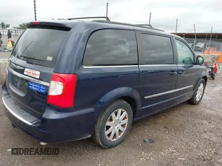 2015 Chrysler Town & Country Touring with VIN 2C4RC1BG3FR716002, listed as a IAAI auction lot 42139802 with 182,830 mi miles and . Bid and sale history available at DreamBid. Image 4.