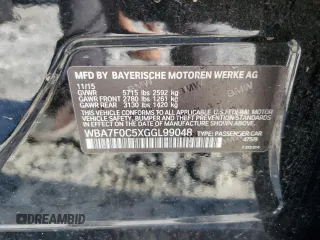 2016 BMW 7 Series 750i with VIN WBA7F0C5XGGL99048, listed as a Copart auction lot 84815364 with 96,743 mi miles and Salvage Title. Bid and sale history available at carsss.com. Image 12.