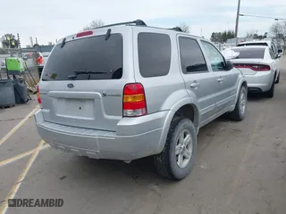 2005 Ford Escape Hybrid with VIN 1FMCU95H05KC95225, listed as a IAAI auction lot 41798610 with 216,659 mi miles. Bid and sale history available at carsss.com. Image 4.