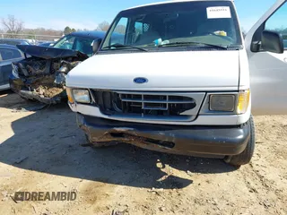 1999 Ford Econoline Cargo with VIN 1FTRE14W0XHB64440, listed as a IAAI auction lot 41645551 with 239,114 mi miles. Bid and sale history available at carsss.com. Image 6.