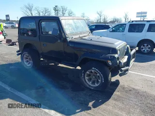 1997 Jeep Wrangler SE with VIN 1J4FY29P6VP438125, listed as a IAAI auction lot 41770455 with 163,001 mi miles. Bid and sale history available at carsss.com. Image 1.