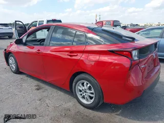 2021 Toyota Prius L Eco with VIN JTDKAMFU6M3148195, listed as a IAAI auction lot 41801369 with 130,601 mi miles. Bid and sale history available at carsss.com. Image 3.