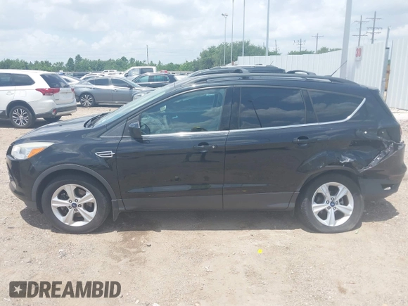 2013 Ford Escape SE with VIN 1FMCU9GX0DUC42483, listed as a IAAI auction lot 42549857 with 138,028 mi miles and . Bid and sale history available at DreamBid. Image 14.