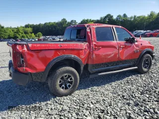 2017 Ram 1500 Rebel with VIN 1C6RR7YT2HS674131, listed as a Copart auction lot 61403835 with 24,675 mi miles and Salvage title. Bid and sale history available at DreamBid. Image 3.