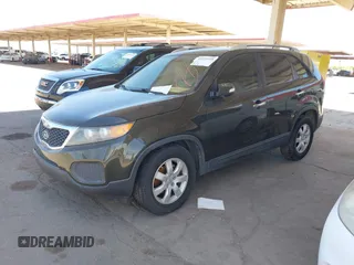 2012 Kia Sorento LX with VIN 5XYKT4A21CG242866, listed as a IAAI auction lot 42172159 with 217,651 mi miles. Bid and sale history available at carsss.com. Image 2.