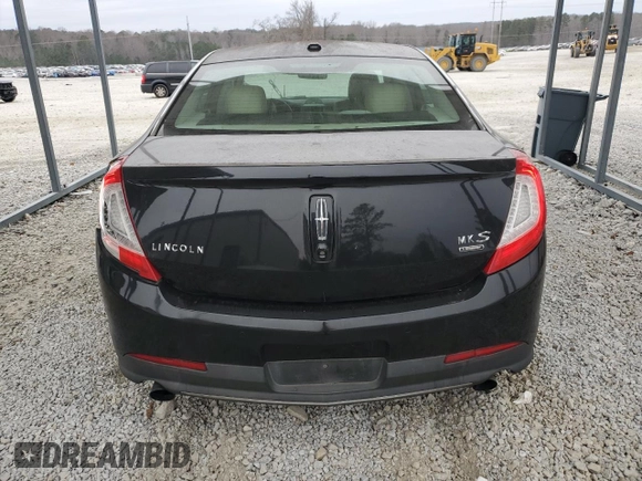 2014 Lincoln MKS EcoBoost z VIN 1LNHL9FT5EG601141, wystawiony jako Copart lot #86497854 z przebiegiem 136 915 mil mil oraz Szkoda całkowita • Salvage title. Historia ofert i sprzedaży dostępna na DreamBid. Obrazek 6.