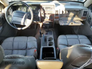1995 Jeep Grand Cherokee Limited with VIN 1J4GZ78S7SC613568, listed as a Copart auction lot 83365584 with 184,099 mi miles and Salvage Title. Bid and sale history available at carsss.com. Image 8.
