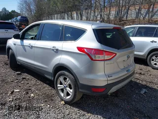 2014 Ford Escape SE with VIN 1FMCU9GX5EUD36442, listed as a IAAI auction lot 41984241 with 105,423 mi miles. Bid and sale history available at carsss.com. Image 3.