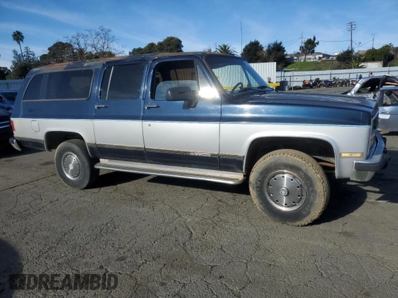 1991 Chevrolet Suburban z VIN 1GNGV26K1MF104219, wystawiony jako Copart lot #87527045 z przebiegiem 189 345 mil mil oraz Czysty tytuł • Clean title. Historia ofert i sprzedaży dostępna na DreamBid. Obrazek 4.