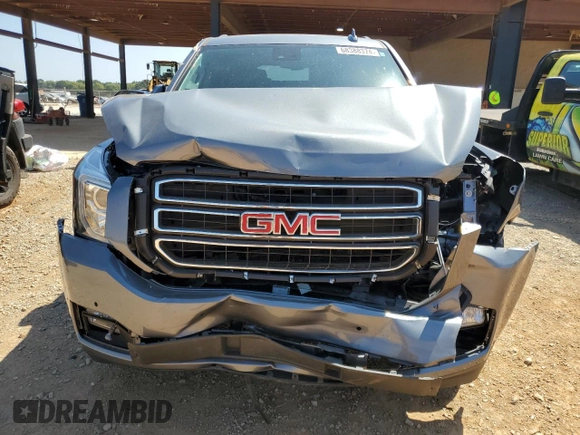 2020 GMC Yukon SLT Standard Edition with VIN 1GKS2DKC5LR263946, listed as a Copart auction lot 68388374 with 66,652 mi miles and Salvage Title. Bid and sale history available at carsss.com. Image 5.