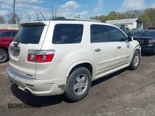 2011 GMC Acadia Denali with VIN 1GKKVTED5BJ329592, listed as a IAAI auction lot 42022700 with 210,336 mi miles. Bid and sale history available at carsss.com. Image 4.