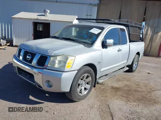 2004 Nissan Titan SE with VIN 1N6AA06A84N532698, listed as a IAAI auction lot 41736557 with 149,743 mi miles. Bid and sale history available at carsss.com. Image 2.