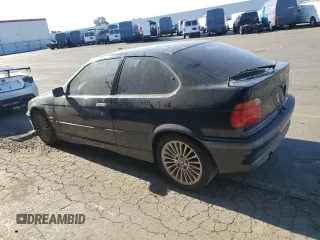 1997 BMW 3 Series 318tiA with VIN WBACG8326VAU38752, listed as a Copart auction lot 79974764 with 169,444 mi miles and Clean Title. Bid and sale history available at carsss.com. Image 2.