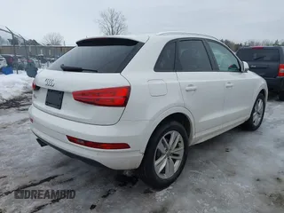 2017 Audi Q3 Premium z VIN WA1BCCFS4HR016424, wystawiony jako IAAI lot #41627278 z przebiegiem 60 028 mil mil oraz . Historia ofert i sprzedaży dostępna na DreamBid. Obrazek 4.