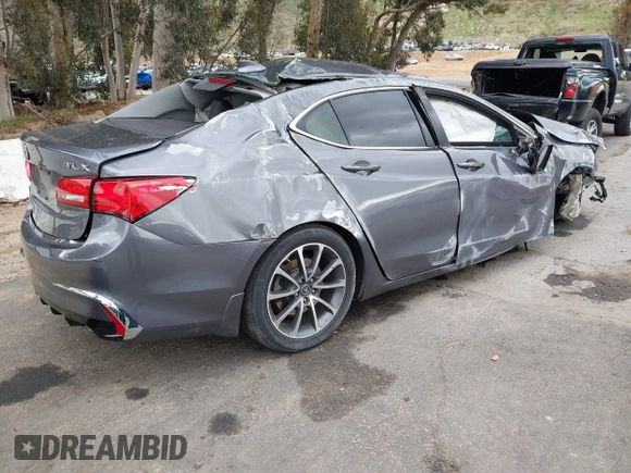 2019 Acura TLX with VIN 19UUB2F39KA009156, listed as a IAAI auction lot 41777615 with 111,540 mi miles and . Bid and sale history available at DreamBid. Image 4.