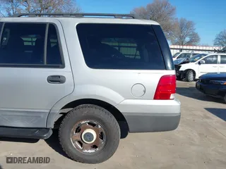 2004 Ford Expedition XLS with VIN 1FMRU13W64LB51765, listed as a IAAI auction lot 41760670 with 84,333 mi miles. Bid and sale history available at carsss.com. Image 19.