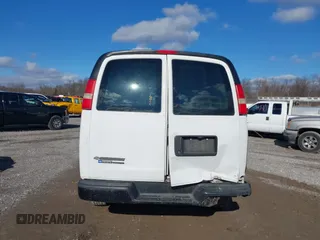 2014 Chevrolet Express Cargo Van with VIN 1GCWGFCA2E1148147, listed as a IAAI auction lot 41101132 with 110,648 mi miles. Bid and sale history available at carsss.com. Image 15.