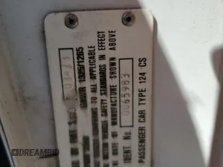 1973 FIAT 124 Spider z VIN 124CS0065983, wystawiony jako Copart lot #57913365 z przebiegiem Nie podano mil oraz Tytuł czysty. Historia ofert i sprzedaży dostępna na DreamBid. Obrazek 13.