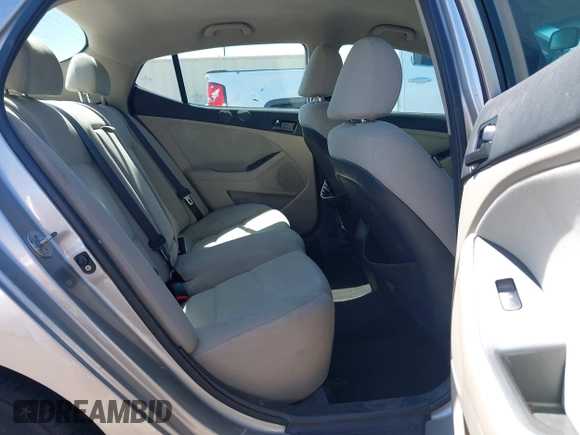 2013 Kia Optima LX with VIN KNAGM4A74D5423255, listed as a IAAI auction lot 42065230 with 116,589 mi miles. Bid and sale history available at carsss.com. Image 8.