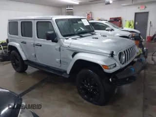 2024 Jeep Wrangler Sahara with VIN 1C4RJXP63RW202929, listed as a IAAI auction lot 41002346 with 12,332 mi miles and . Bid and sale history available at DreamBid. Image 1.