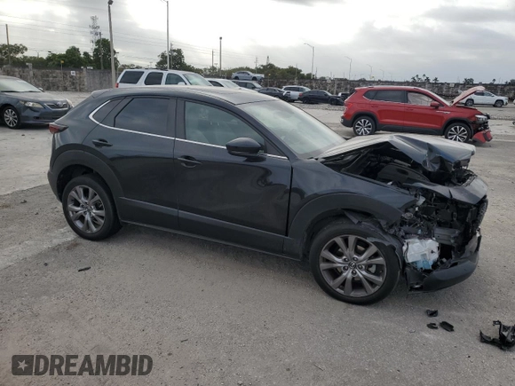 2021 Mazda CX-30 Preferred with VIN 3MVDMACL7MM244487, listed as a Copart auction lot 84307604 with 72,017 mi miles and Salvage Title. Bid and sale history available at DreamBid. Image 4.