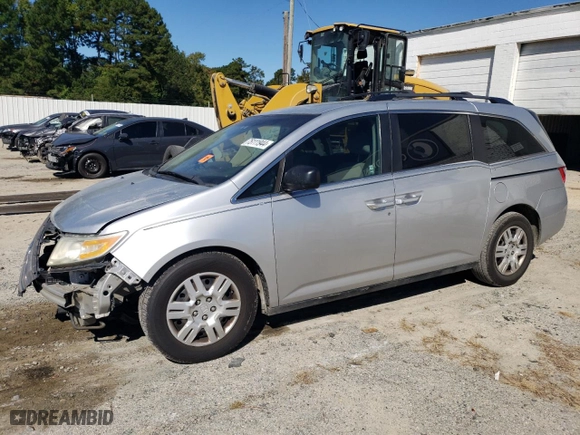 2011 Honda Odyssey LX with VIN 5FNRL5H29BB069775, listed as a Copart auction lot 75111944 with 169,225 mi miles and Salvage Title. Bid and sale history available at carsss.com. Image 1.