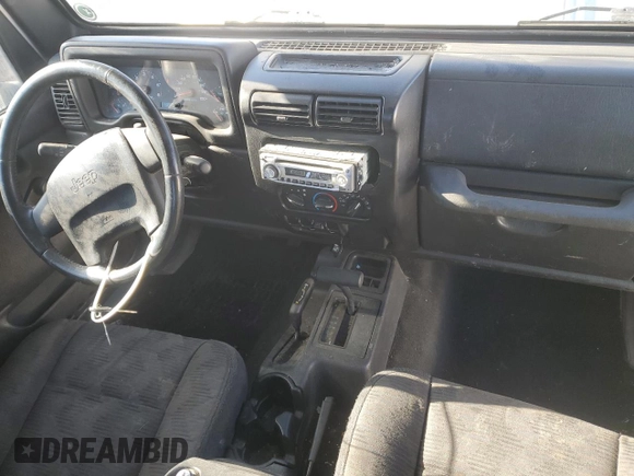 2003 Jeep Wrangler X with VIN 1J4FA39S63P304582, listed as a Copart auction lot 83576014 with 139,002 mi miles and Salvage Title. Bid and sale history available at carsss.com. Image 8.