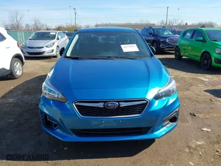 2017 Subaru Impreza with VIN 4S3GTAA66H3709704, listed as a IAAI auction lot 41879065 with 83,814 mi miles. Bid and sale history available at carsss.com. Image 12.