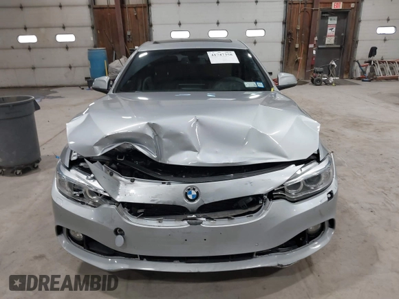 2016 BMW 4 Series 428i xDrive with VIN WBA4C9C5XGG138843, listed as a IAAI auction lot 41747358 with 63,804 mi miles and . Bid and sale history available at DreamBid. Image 12.