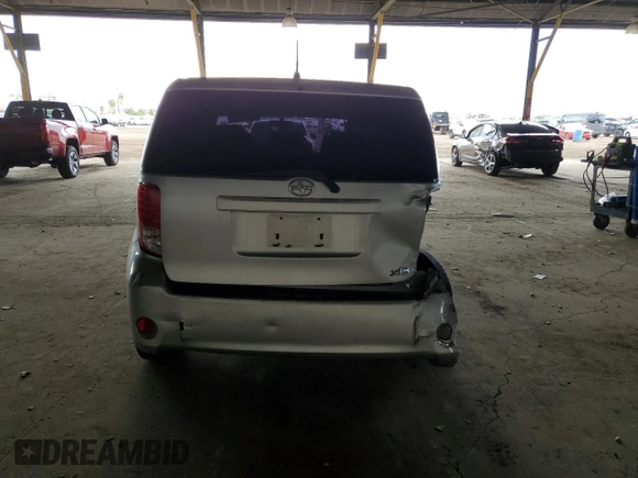 2012 Scion xB with VIN JTLZE4FE5CJ023537, listed as a Copart auction lot 55863315 with 230,648 mi miles and Salvage Title. Bid and sale history available at DreamBid. Image 6.
