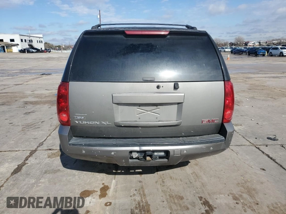 2007 GMC Yukon XL SLT with VIN 1GKFC16047J260991, listed as a Copart auction lot 43289595 with 201,627 mi miles and Salvage Title. Bid and sale history available at carsss.com. Image 6.