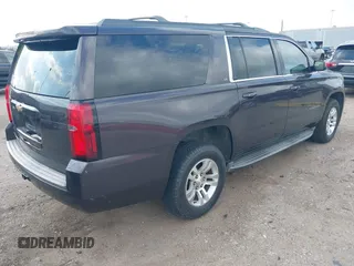 2015 Chevrolet Suburban LT with VIN 1GNSCJKCXFR175154, listed as a IAAI auction lot 42280418 with 227,373 mi miles and . Bid and sale history available at DreamBid. Image 4.