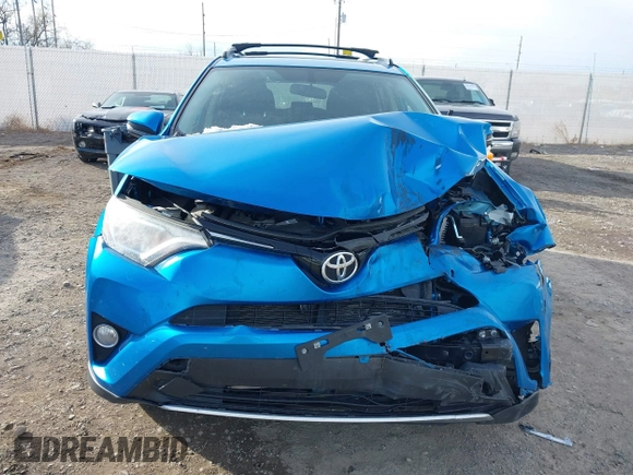2016 Toyota RAV4 XLE with VIN JTMRFREV4GD186580, listed as a IAAI auction lot 40916703 with 117,120 mi miles and . Bid and sale history available at DreamBid. Image 6.