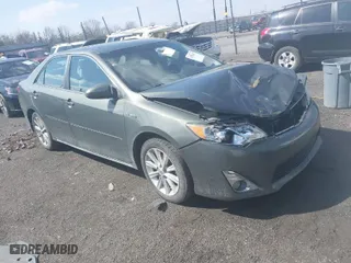 2014 Toyota Camry Hybrid LE with VIN 4T1BD1FK6EU129691, listed as a IAAI auction lot 41796112 with 264,392 mi miles. Bid and sale history available at carsss.com. Image 1.
