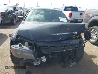 2014 Chrysler 300 with VIN 2C3CCABG7EH221929, listed as a IAAI auction lot 41700351 with 129,632 mi miles. Bid and sale history available at carsss.com. Image 12.