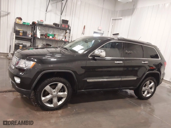 2011 Jeep Grand Cherokee Overland with VIN 1J4RR6GT7BC607735, listed as a IAAI auction lot 41830669 with 98,161 mi miles. Bid and sale history available at carsss.com. Image 15.