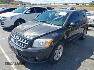 2011 Dodge Caliber Mainstreet with VIN 1B3CB3HA9BD120950, listed as a IAAI auction lot 42150354 with 103,015 mi miles. Bid and sale history available at carsss.com. Image 2.