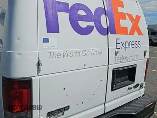2010 Ford Econoline Cargo Commercial with VIN 1FTNE1EWXADA91296, listed as a IAAI auction lot 42571036 with 154,626 mi miles and . Bid and sale history available at DreamBid. Image 2.