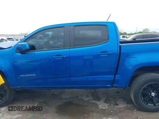 2021 Chevrolet Colorado 2WD LT z VIN 1GCGSCEN9M1226777, wystawiony jako IAAI lot #41895262 z przebiegiem 68 065 mil mil oraz . Historia ofert i sprzedaży dostępna na DreamBid. Obrazek 14.