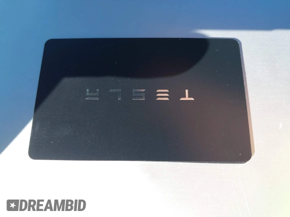 2025 Tesla Model Y Long Range with VIN 7SAYGDED4SF226776, listed as a IAAI auction lot 41514317 with 1,636 mi miles and . Bid and sale history available at DreamBid. Image 11.