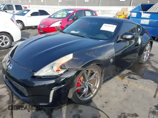 2014 Nissan 370Z Touring with VIN JN1AZ4EH1EM631097, listed as a IAAI auction lot 41230197 with 85,304 mi miles. Bid and sale history available at carsss.com. Image 17.