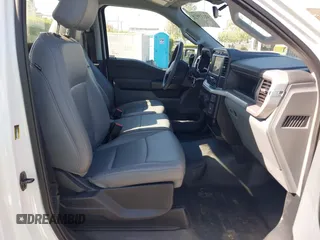 2023 Ford F-150 XL with VIN 1FTMF1CBXPKE40924, listed as a IAAI auction lot 42115874 with 15,411 mi miles and . Bid and sale history available at carsss.com. Image 5.