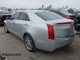 2013 Cadillac ATS Luxury z VIN 1G6AB5RX9D0156834, wystawiony jako IAAI lot #41870392 z przebiegiem 60 952 mil mil oraz . Historia ofert i sprzedaży dostępna na DreamBid. Obrazek 3.